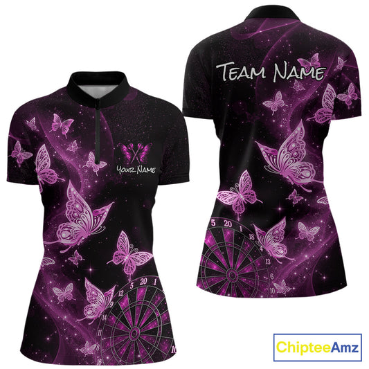 Front and back views of a short-sleeve women's polo shirt with a black base, purple and pink butterfly print, and a dartboard graphic near the hem. The front has a partial zip collar and placeholder text 'Your Name', while the back has 'TEAM NAME'.