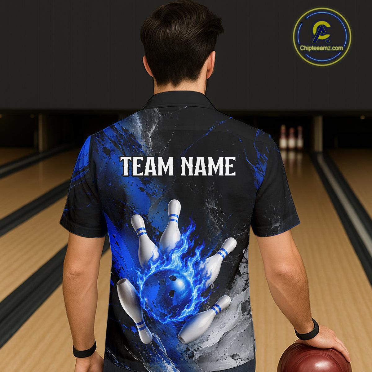Back view of man wearing black and blue flaming Hawaiian bowling shirt.