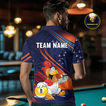A man viewed from behind wearing a custom printed polo shirt in a pool hall setting. The shirt features a dark blue background with orange and white graphic stripes, the text 'TEAM NAME' across the upper back, and a cartoon rooster holding a yellow billiard ball on the lower back.