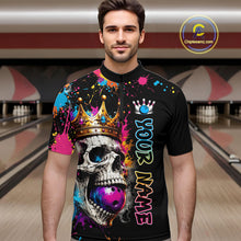 Load image into Gallery viewer, Man wearing a colorful bowling shirt with a skull design in a bowling alley.