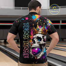 Load image into Gallery viewer, Person wearing a colorful bowling shirt with a skull and crown design in a bowling alley.