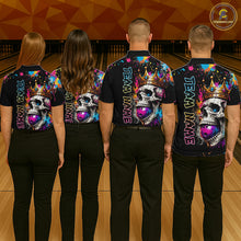 Load image into Gallery viewer, Four people wearing matching colorful bowling shirts with skull designs on a bowling alley.