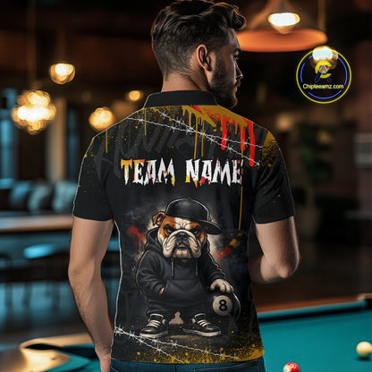 A back view of a custom black billiards polo shirt worn by a male model. The shirt features a funny hip hop bulldog on the back, with a large white 'TEAM NAME' text placeholder. The background is a billiards room with a table and hanging lights.
