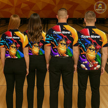 Load image into Gallery viewer, Four people wearing colorful bowling shirts with a cartoon character and 'Team Name' text at a bowling alley.