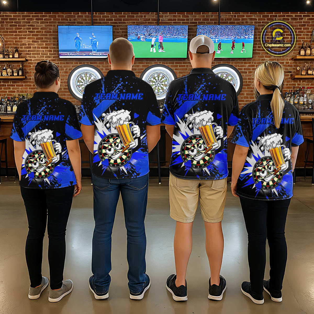 Four people standing with their backs to the camera in a bar-like environment, wearing matching black and blue custom graphic t-shirts with a skull and beer design on the back and 'TEAM NAME' printed on the front.