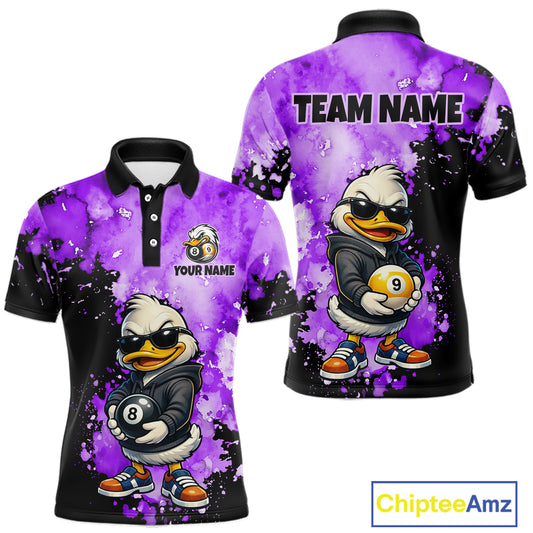 Front and back views of a custom short-sleeve polo shirt featuring a cartoon duck character in a black jacket and sunglasses, holding pool balls, with a purple and black watercolor splatter design. The front shows a customizable logo area reading 'YOUR NAME', and the back displays 'TEAM NAME'.