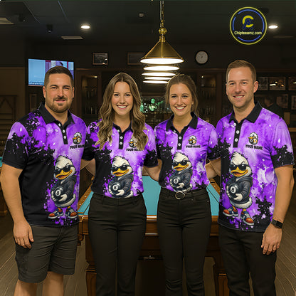 Four people standing together in a billiards or pool room wearing matching purple and black polo shirts with a cartoon duck graphic