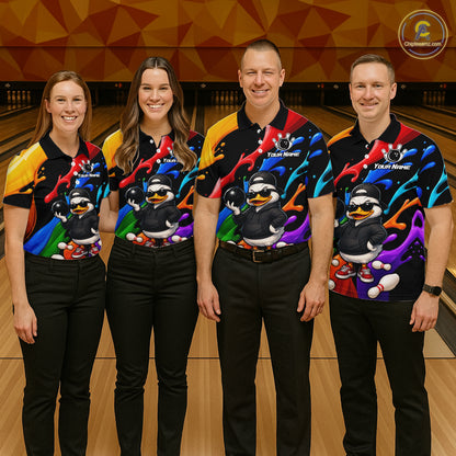 Four people standing in a bowling alley wearing matching colorful bowling shirts with a cartoon duck graphic and 'Team Name' text, paired with black pants.