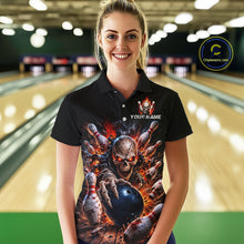 Load image into Gallery viewer, Person wearing a black bowling shirt with a colorful design in a bowling alley.