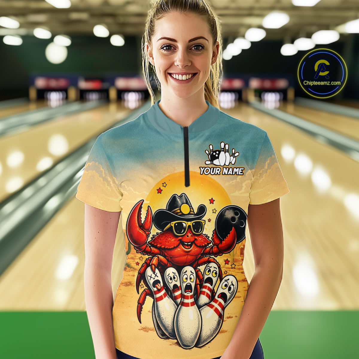 Person wearing a shirt with a colorful design of a crab and bowling pins in a bowling alley.