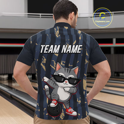 Man wearing a bowling shirt with a cartoon cat design and 'TEAM NAME' text in a bowling alley.