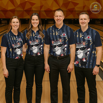 Four people wearing matching bowling shirts with a cat design on a bowling alley.