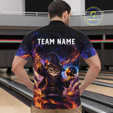 Load image into Gallery viewer, Person wearing a black t-shirt with a cat wizard design and 'TEAM NAME' text in a bowling alley.