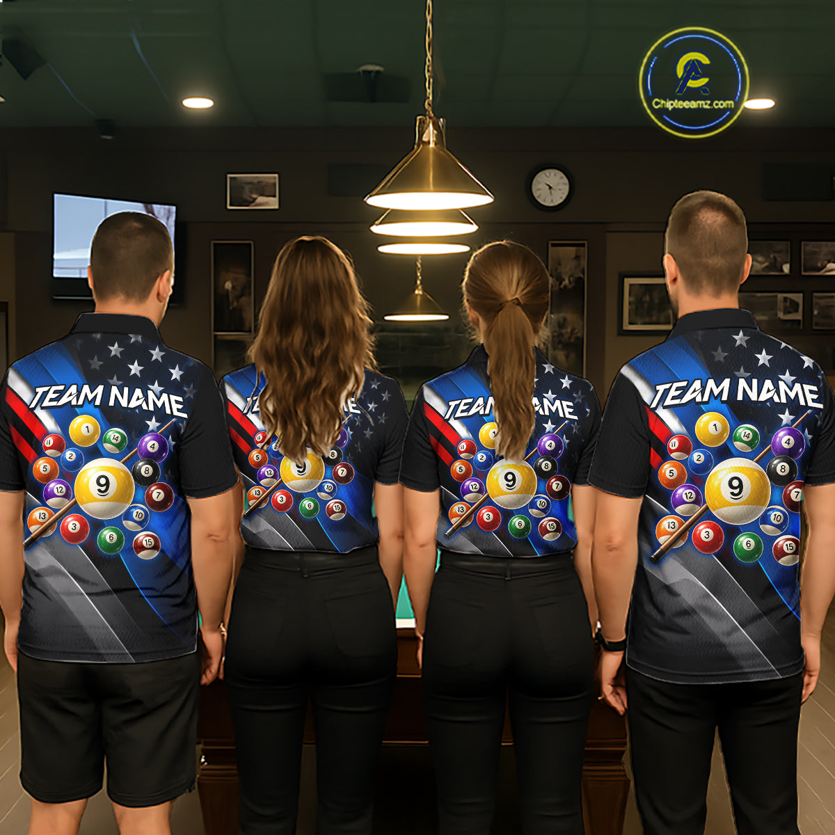 Four people standing with their backs to the camera in a dimly lit indoor room, wearing matching dark blue and black custom racing-style jerseys with billiard ball graphics and 'TEAM NAME' printed across the back.