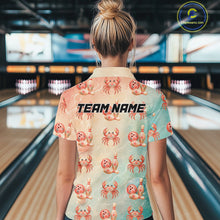 Load image into Gallery viewer, Person wearing a shirt with crab and bowling ball patterns in a bowling alley.