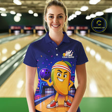 Load image into Gallery viewer, Woman wearing a blue bowling-themed shirt with a cartoon character in a bowling alley.