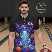 Load image into Gallery viewer, Man wearing a black polo shirt with a colorful alien design in a bowling alley.
