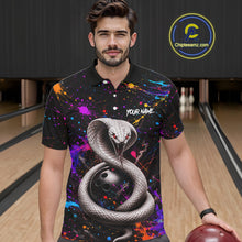 Load image into Gallery viewer, Man wearing a colorful polo shirt with a snake design in a bowling alley.