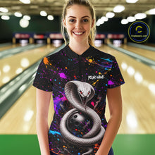 Load image into Gallery viewer, Woman wearing a colorful bowling shirt with a snake design in a bowling alley.