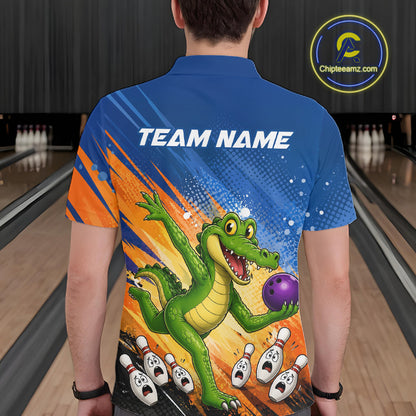 A person viewed from behind wearing a short-sleeve bowling-themed shirt with a large green alligator graphic holding a purple bowling ball, orange and blue background graphics, and the text 'TEAM NAME' across the upper back. Bowling lanes are visible in the background