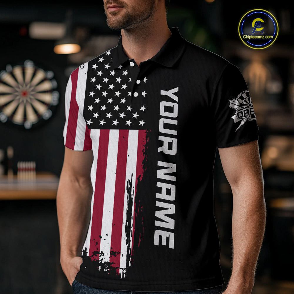 A man wearing a custom patriotic dart polo shirt featuring a distressed American flag graphic in a professional dart room.
