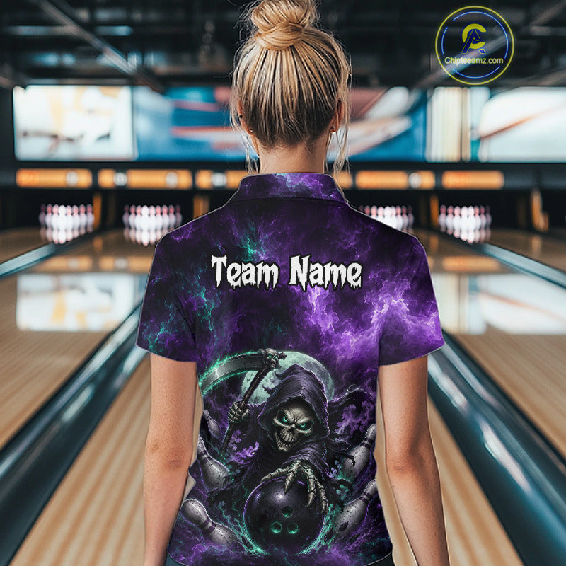 A woman viewed from behind wearing a short-sleeve bowling-themed polo shirt with a purple and black cosmic graphic and the words 'Team Name' printed across the back. Bowling alley lanes are visible in the background