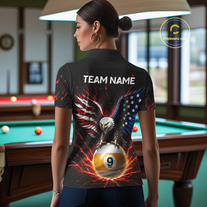 Person wearing a black shirt with an eagle and pool ball design in a room with a pool table.