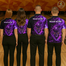Load image into Gallery viewer, Four people wearing a black bowling polo shirt featuring a flaming skull with glowing orange eyes, purple smoke effects, and custom “TEAM NAME” text