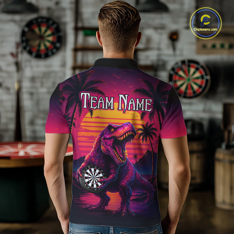 Man wearing darts polo shirt featuring a dinosaur holding a dartboard with sunset and palm tree artwork on a colorful background