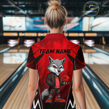 Load image into Gallery viewer, Woman wearing a red and black bowling polo shirt featuring a gray wolf mascot holding a red bowling ball, with custom team name text.