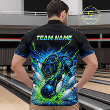 Load image into Gallery viewer, Man wearing a black bowling shirt with a colorful tiger design and 'TEAM NAME' text in a bowling alley.