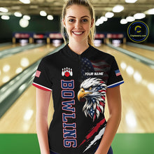 Load image into Gallery viewer, Person wearing a black bowling shirt with an eagle design and 'Bowling' text in a bowling alley.