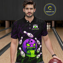 Load image into Gallery viewer, Man wearing a black bowling-themed shirt with colorful designs in a bowling alley.
