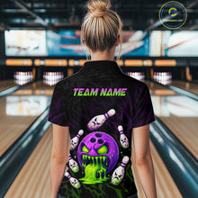 Load image into Gallery viewer, Person wearing a black bowling shirt with colorful design and 'TEAM NAME' text in a bowling alley.