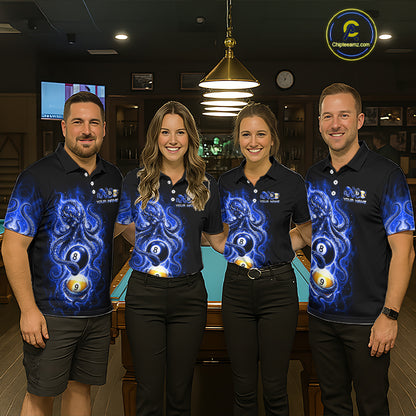 Four people wearing matching blue and black shirts with a pool ball design in a bar setting.