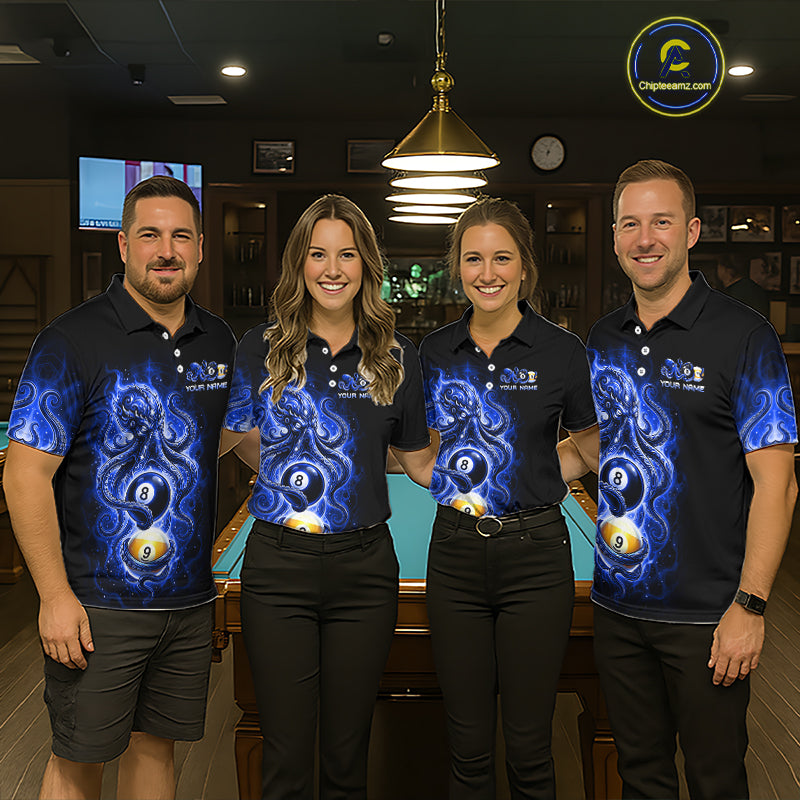 Four people wearing matching blue and black shirts with a pool ball design in a bar setting.