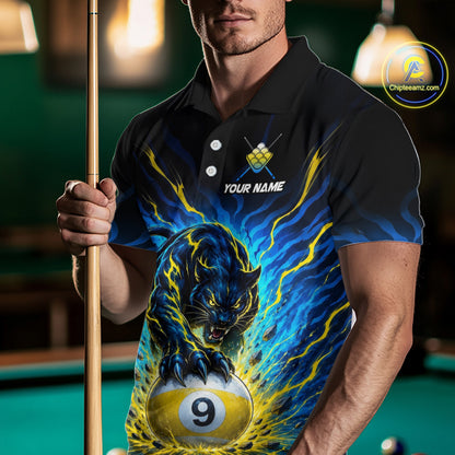 Man wearing a polo shirt with a panther design holding a pool cue in a billiards setting.