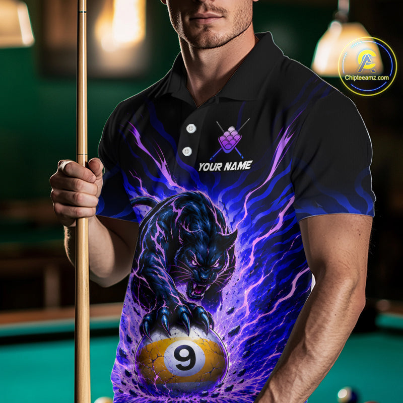Man holding a pool cue wearing a black shirt with a panther and pool ball design.