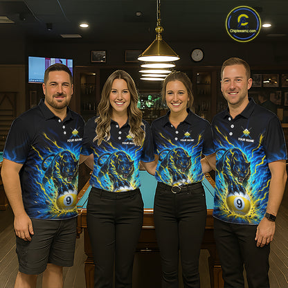 Four people wearing matching blue and yellow shirts with a logo in a bar setting.