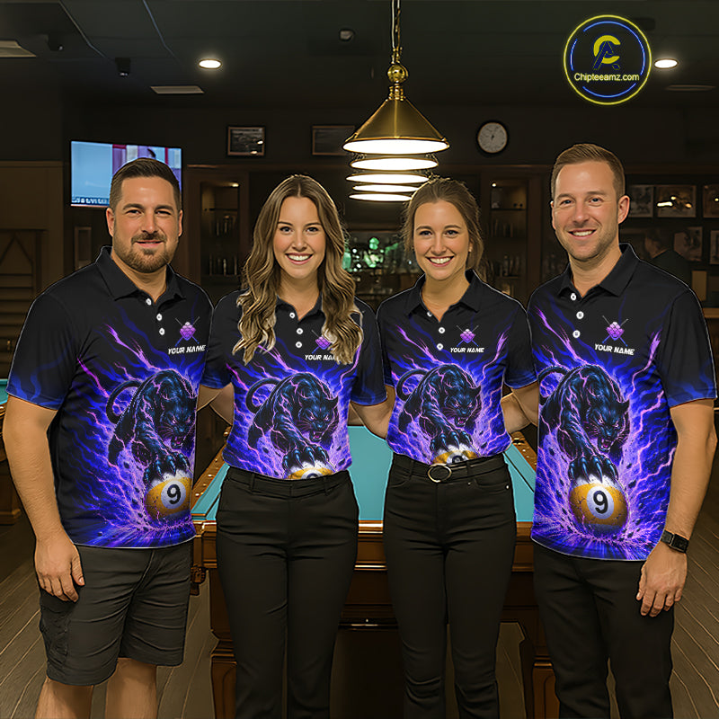 Four people wearing matching polo shirts with a graphic design in a bar setting.