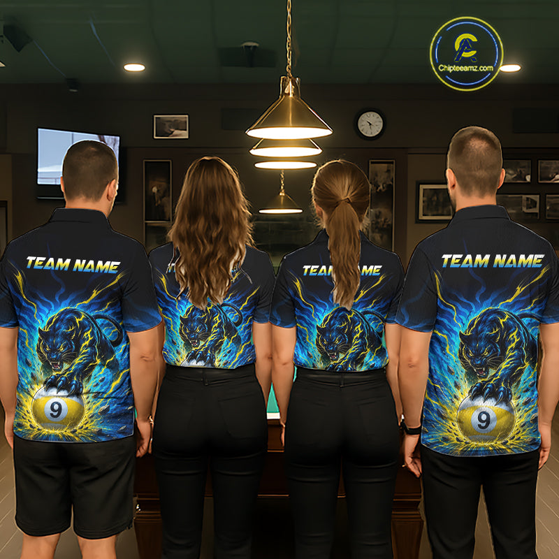 Four people wearing matching shirts with a team name and panther design in a room.