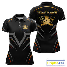 Load image into Gallery viewer, Black polo shirt with gold and orange accents, featuring a team logo and text on a white background.