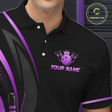 Load image into Gallery viewer, Black polo shirt with purple logo and text, featuring a bowling ball with a crown design.