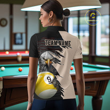 Load image into Gallery viewer, Woman wearing a shirt with an eagle and number 9 design in a pool hall.