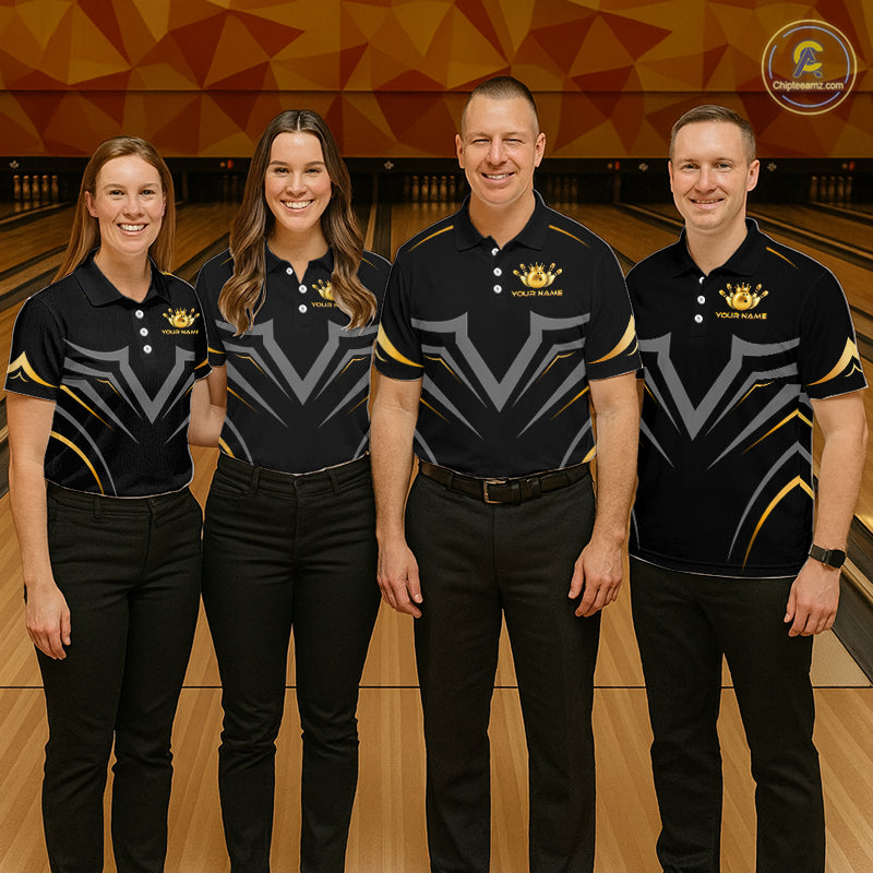 Four people standing in a bowling alley wearing matching black polo shirts with gray and gold geometric patterns and a gold crown logo. The background shows wooden bowling lanes and a geometric orange wall.