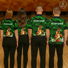 Load image into Gallery viewer, Four people wearing green and black bowling polo shirt featuring a cool rooster mascot wearing sunglasses, a red bowling ball, bowling pins, and custom team name text.
