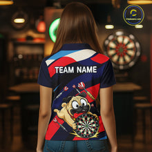 Load image into Gallery viewer, Person wearing a navy, red, and white darts polo featuring a cartoon pug holding a dartboard, flying darts, and custom team text.
