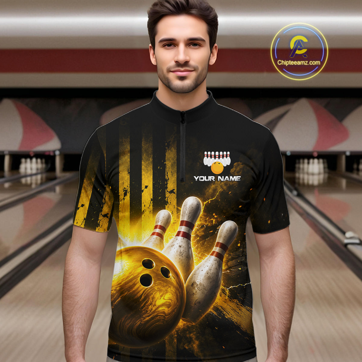 Man wearing a black bowling shirt with a graphic design in a bowling alley.