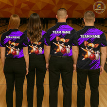 Load image into Gallery viewer, Four people wearing bowling shirts with a team name and cartoon character on a bowling alley.