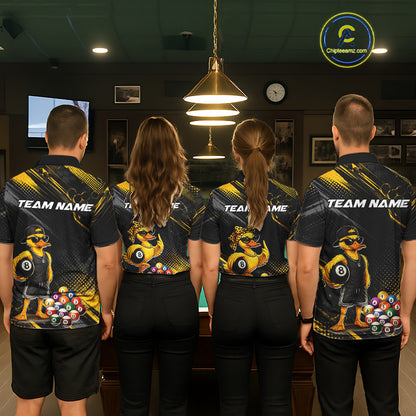 Four people wearing billiards polo shirt featuring a duck holding an eight ball with pool balls arranged across a black yellow background.